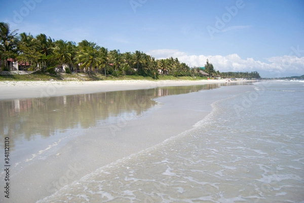 Fototapeta Doc Let Beach in Vietnam. White sand, sea, palm trees on a sunny day