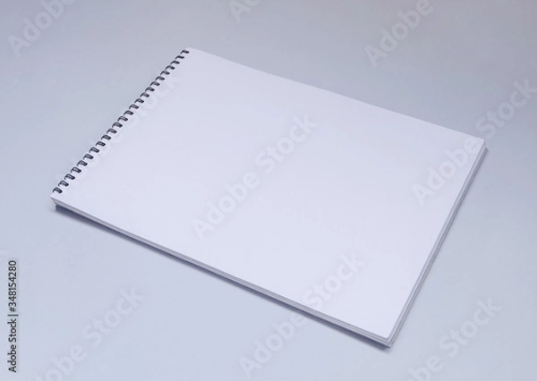 Fototapeta White Spiral Album or sketchbook mock up on light table