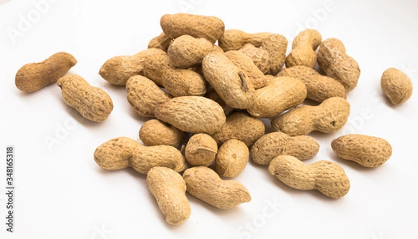 Fototapeta bunch of ecological peanuts on a white background