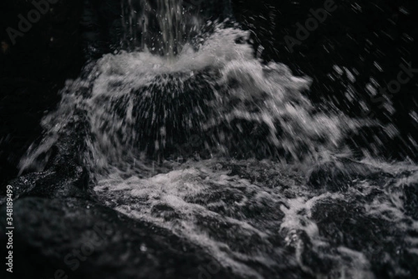 Obraz water splash on black background