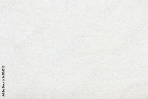 Fototapeta White beige delicate soft background of plush fabric.