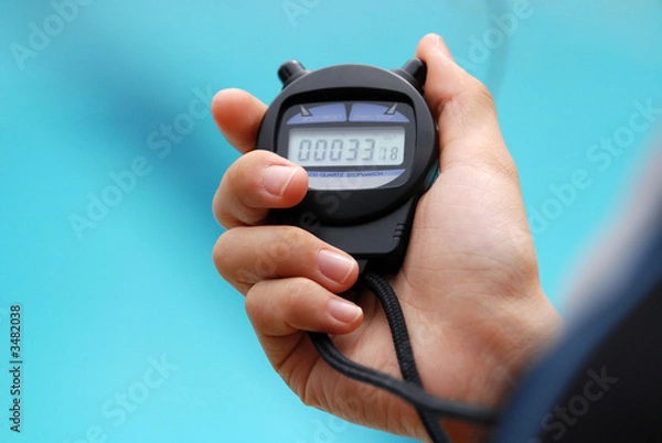 Fototapeta stop watch use during the swimming competition