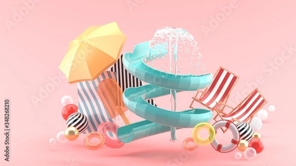 Fototapeta Slider and fountains surrounded by rubber rings, beach chairs, ice cream and umbrellas on a pink background.-3d rendering..