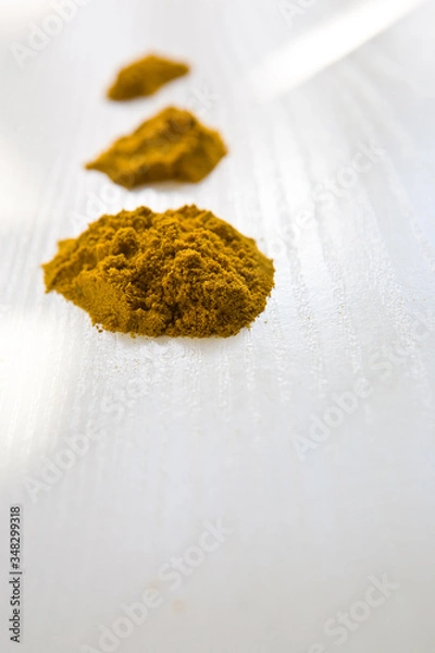 Fototapeta Tree nice cumin heaps on the clear surface