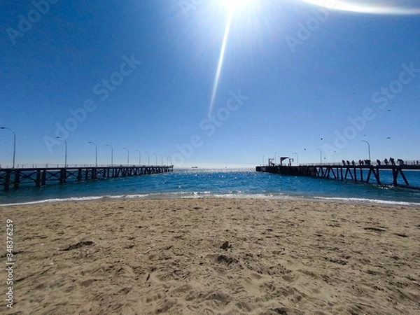Obraz piers on the beach
