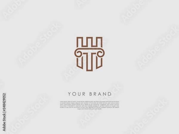 Fototapeta a bronze business logo that have an ancient column, letter t and h and a piece of a wall of a castle at the background