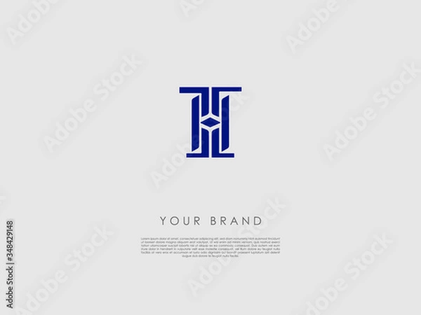 Fototapeta a dark blue business logo which has a diamond shape in the middle and has letters t, h and i