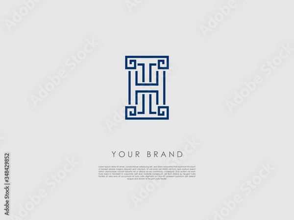 Fototapeta a blue business logo which represents an ancient column and has the letters t and h