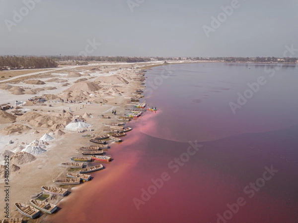 Fototapeta pink lake retba in the suburbs of Dakar photographed from a drone in Africa salt mining