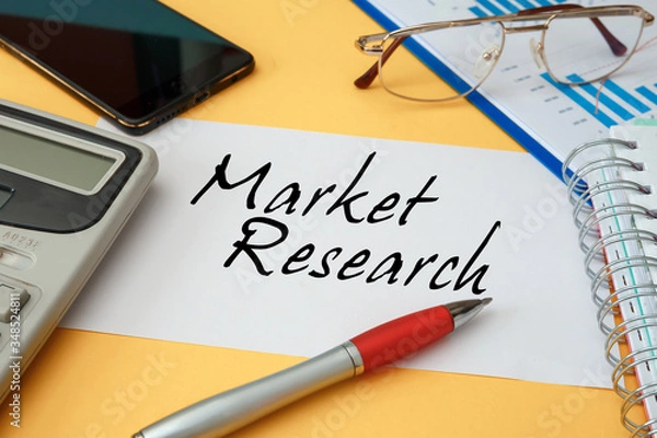 Obraz Workspace office desk - photo on top of workspace card with text Market Research