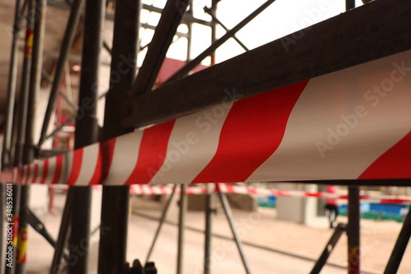 Fototapeta Red and white ribbon. There is no passage. Fenced area. Closed area. Ribbon.