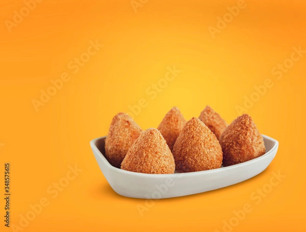 Fototapeta Brazilian appetiser deep fried chiken sttufed croquette - Coxinha de frango
