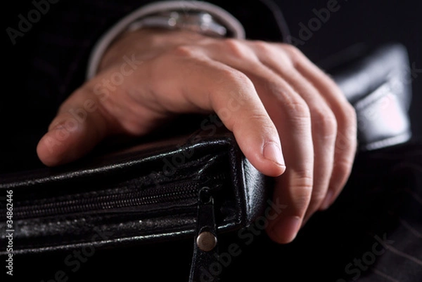 Fototapeta the hands of a businessman