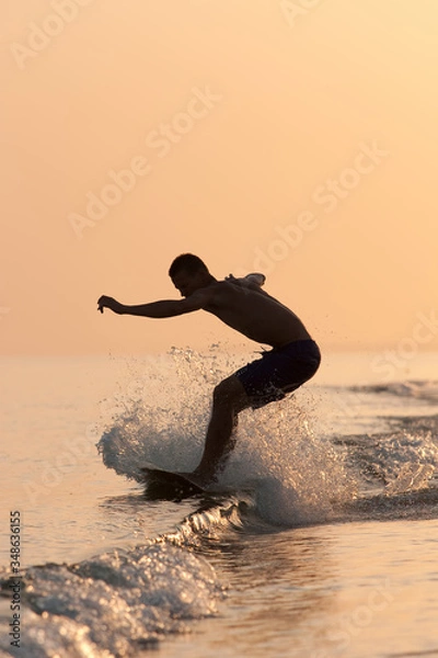 Obraz Surfing at Sunset