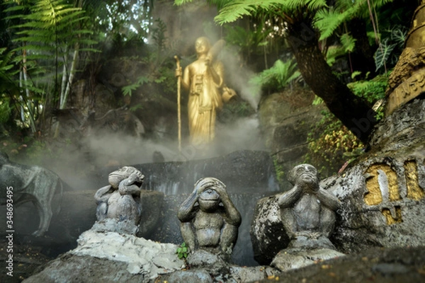 Obraz three wise monkeys statues and waterfall 