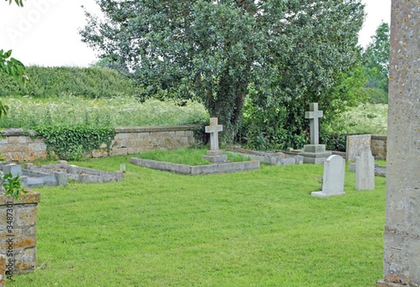 Fototapeta gravestones in a small cemetary