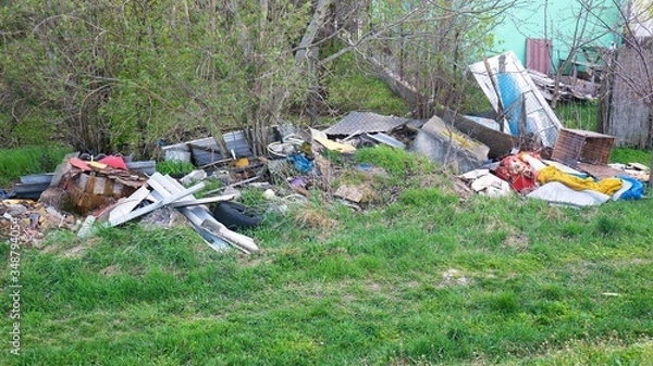 Fototapeta Illegal garbage in nature.