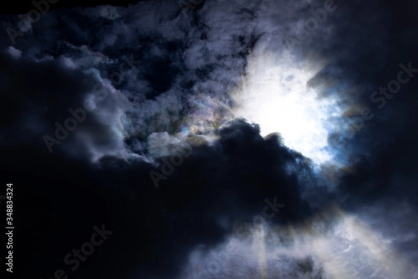 Fototapeta 
Sun rays breaking through thunderclouds, light coming out of the darkness