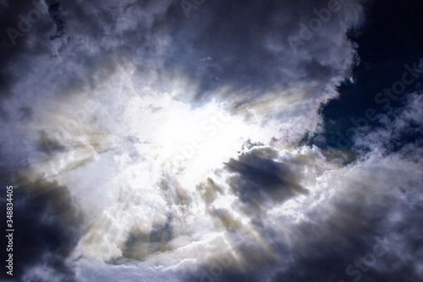 Fototapeta 
Sun rays breaking through thunderclouds, light coming out of the darkness