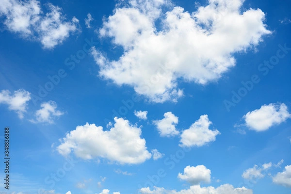 Obraz blue sky background with tiny clouds.