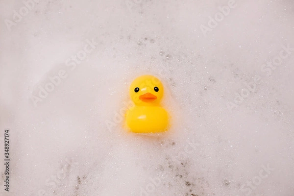Obraz Yellow rubber duck in the bath with bubble foam