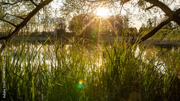 Obraz zachód słońca nad jeziorem 