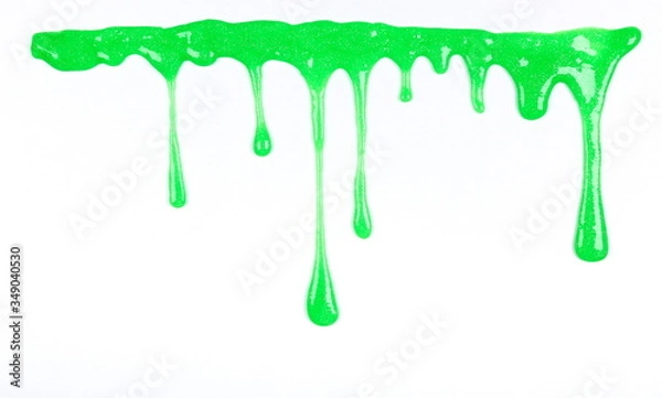 Obraz dripping green slime drops on a white background