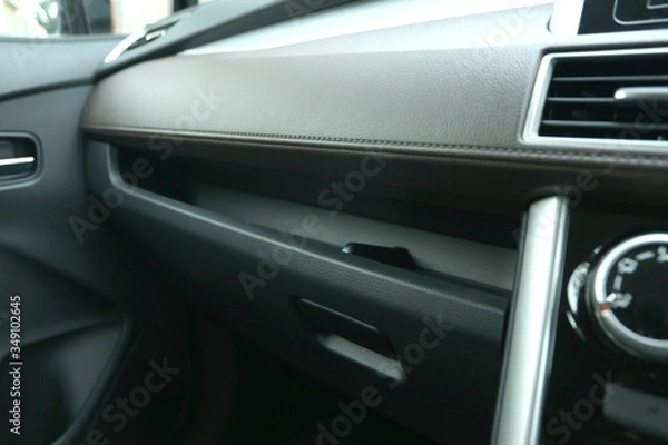 Fototapeta Little space for the person sitting next to the driver in an SUV