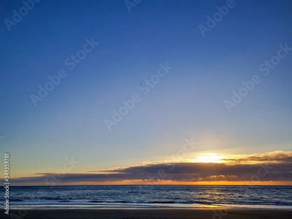 Obraz sunset from the beach güi güi chico