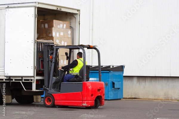 Fototapeta Forklift loading truck