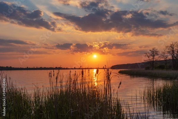 Obraz charming landscape on the river at sunset and night time
