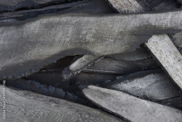 Fototapeta burnt boards. the ashes. close-up, top view.