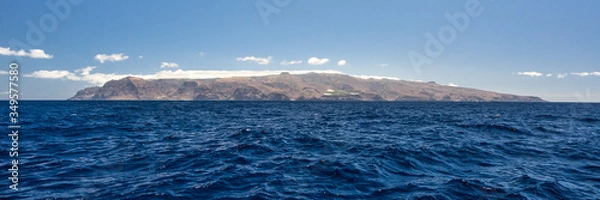 Fototapeta island silhouette of la Gomera from a boat in the ocean