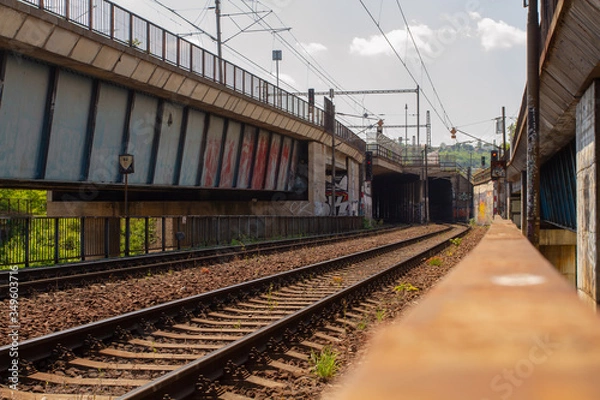 Fototapeta 
old railway bridge for trains in the Czech city and tracks next to it