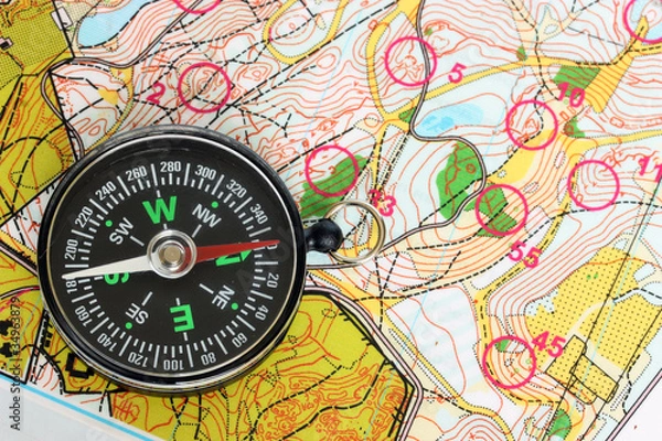 Obraz Compass on a map.
