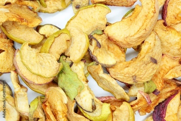 Obraz Beautiful dried apples located on a white background