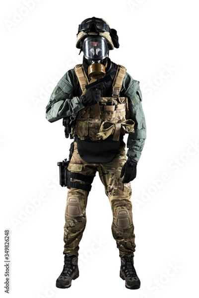 Fototapeta Soldier holding assault rifle. Uniform conforms to special services of the Russian Federation. Shot in studio. Isolated with clipping path on white background