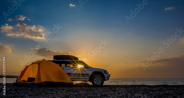 Obraz Adventures Camping tourism and tent and car next to the lake. Landscape outdoor in morning