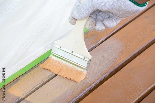 Fototapeta 日曜大工　ウッドデッキのペンキ塗り