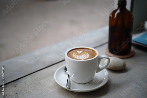 Fototapeta Hot Cappuccino is a recommended menu for coffee lovers, food lovers who like the taste and are fascinated by the aroma of coffee.
