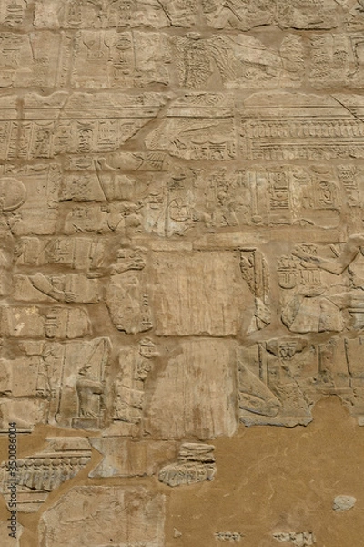 Fototapeta Egyptian ancient hieroglyphs on the stone wall