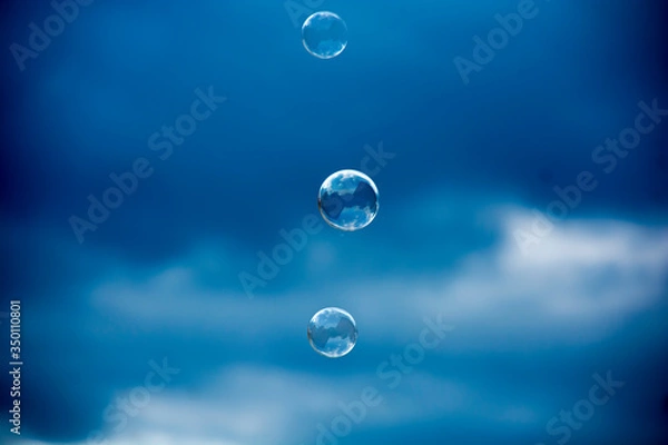 Fototapeta soap bubbles on a blurry background