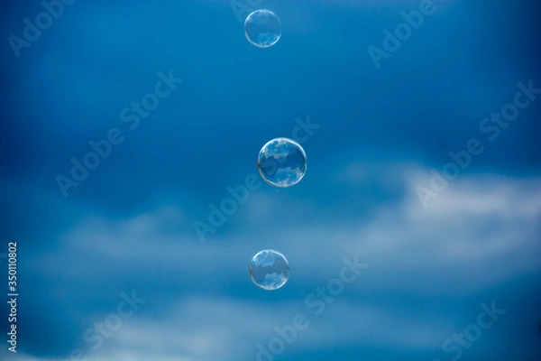 Fototapeta soap bubbles on a blurry background