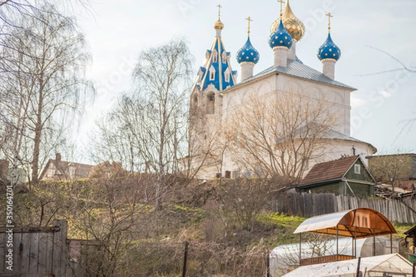 Obraz temple Church on the hill through the trees