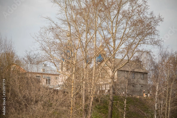 Obraz temple Church on the hill through the trees