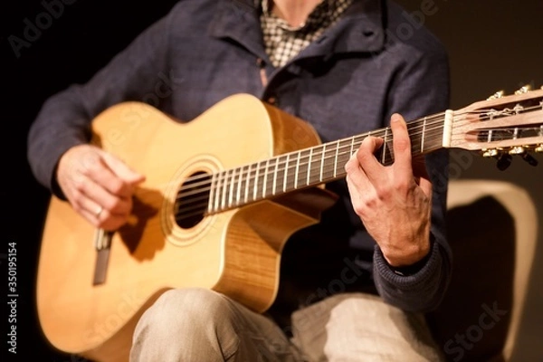 Obraz man playing guitar
