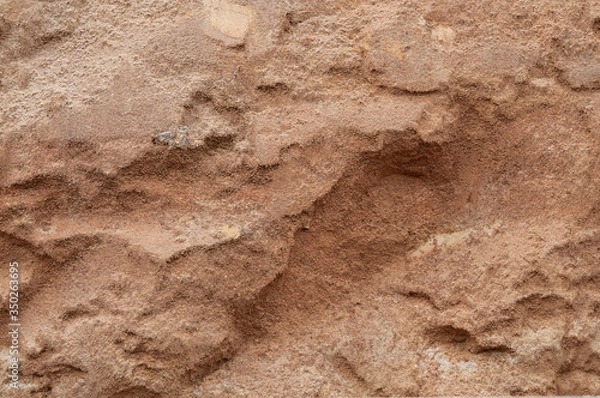 Obraz でこぼこした土壁 ざらざらした土の表面 背景