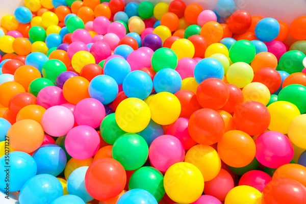 Obraz Small colorful plastic balls in playground yard