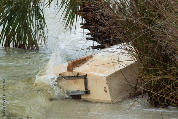 Obraz Capsized row boat on beach