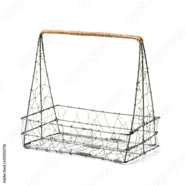 Obraz wire basket on white background